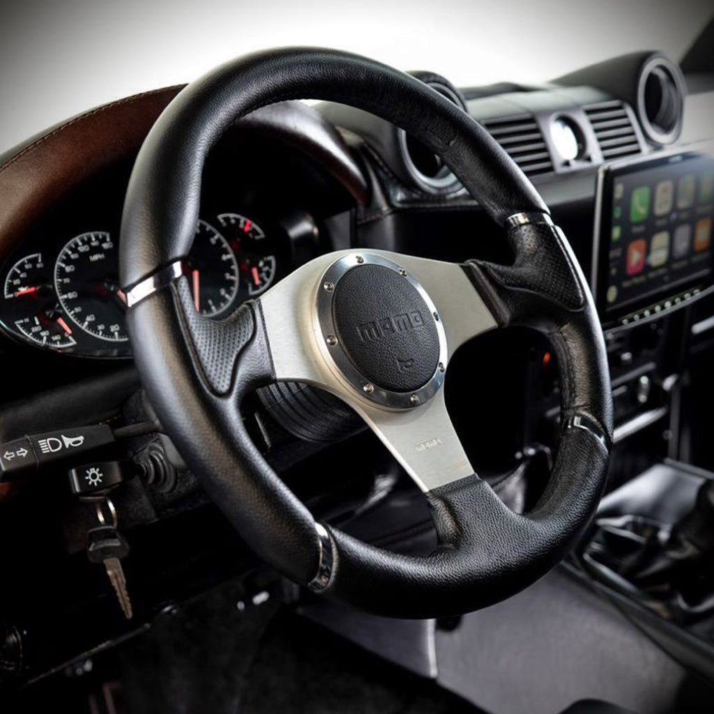 MOMO Millenium Steering Wheel - Black Leather Silver Spokes 320mm